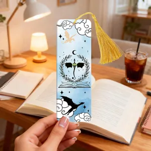 Acrylic fantasy dragon bookmark with gold tassel, beautiful bookish reading accessory.