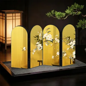 Detail view of the creative gold and silver Chinese-style mirrored folding screen desktop ornament.