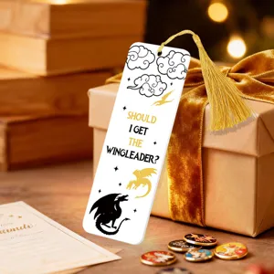 Acrylic bookmark with gold tassel, featuring dragon illustrations and English text quote for reading.