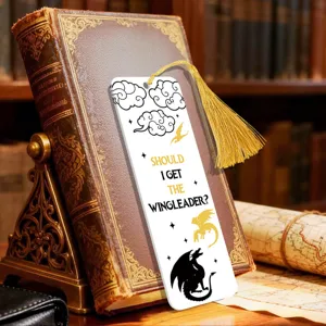 Crystal clear acrylic bookmark with golden tassel and creative dragon design for reading.