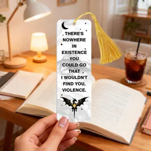 Acrylic tassel bookmark with quote design, clear texture and elegant gold fringe for reading.