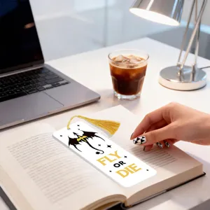 Creative acrylic tassel bookmark with dragon design and quote, perfect for reading and gifts.