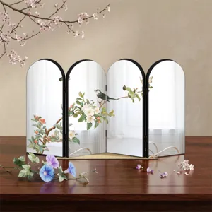Exquisite oriental style folding mirror screen detail, featuring delicate bird and flower art.