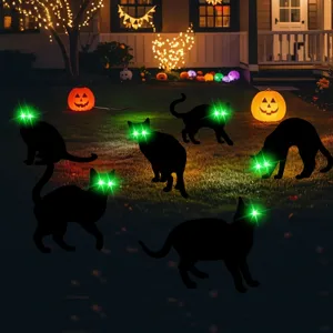 Halloween black cat yard signs with glowing green eyes outdoor decoration for spooky garden lawn.