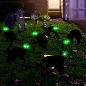 Halloween black cat yard stakes with glowing green eyes for outdoor garden lawn decoration.