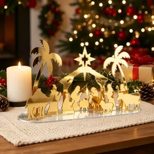 Décoration de Noël en acrylique doré scène de nativité ornement de table détail.