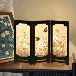Detailed view of a Chinese style mini folding screen desktop ornament with floral butterfly art.