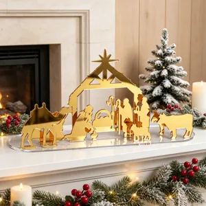 Figurine de crèche de Noël en acrylique miroir doré, détail de décoration festive.
