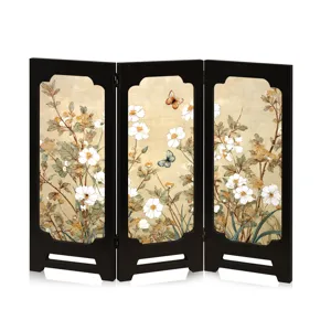 Detailed shot of Chinese style retro folding desktop screen ornament with floral design.