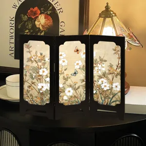 Vintage desktop folding screen ornament with retro floral butterfly art for home decor detail.