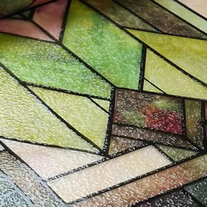 Close-up of 3D embossed stained glass window film, decorative static cling privacy film.