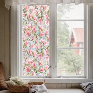 Close-up view of pink magnolia floral static window film showing vibrant botanical pattern texture.