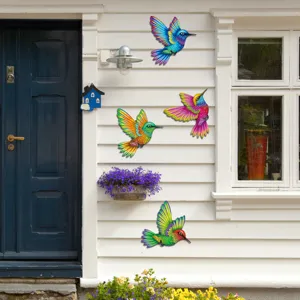 Colorful metal hummingbird wall art set for garden, yard, and outdoor home decoration.