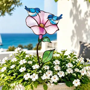 Piquet de jardin fleur en verre teinté et oiseaux bleus, détail déco pot de fleurs en métal.