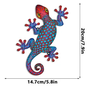 Detailed view of the colorful metal gecko wall hanging with red and blue pattern and curl tail.