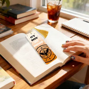 Translucent acrylic bookmark with elegant gold tassel, fantasy dragon quote design detail