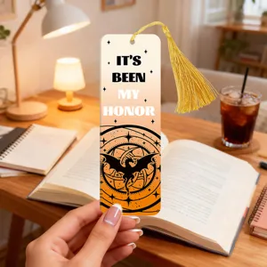 Acrylic translucent bookmark with golden tassel, colorful gradient design for reading and gifts.
