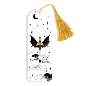 Close-up detail of the black and gold fantasy dragon design bookmark with a luxury silk tassel.