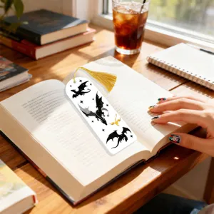 Acrylic bookmark featuring fantasy dragon patterns and elegant golden tassel for reading.