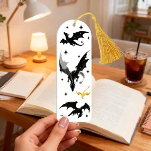Acrylic dragon bookmark with gold tassel closeup detail view for reading and book lovers desk decor