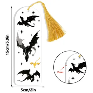 Detail view of the clear acrylic dragon bookmark featuring glowing star patterns and tassel.