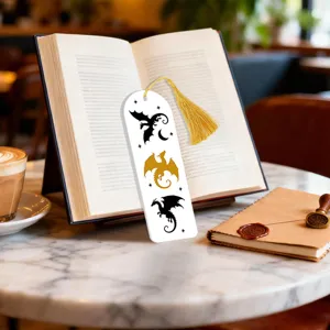 Creative acrylic bookmark with gold tassel, elegant dragon pattern design for book lovers.