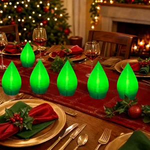 Dettaglio ornamento luce LED albero di Natale, decorazione tavolo festa e atmosfera calda.