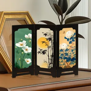 Mini wooden table screen detail, traditional Chinese floral and bamboo painting decor.