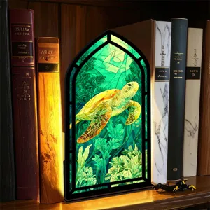 Inserto per libreria angolare illuminato con design subacqueo di tartaruga marina in vetro.