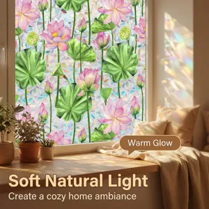 Lotus window film detail showing vibrant botanical pattern and warm sunlight shining through.