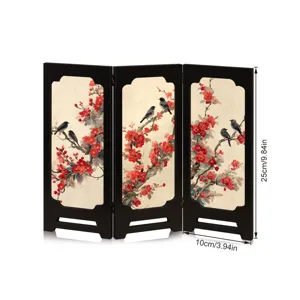 Detail shot of miniature wooden folding screen with traditional plum blossom and bird art.
