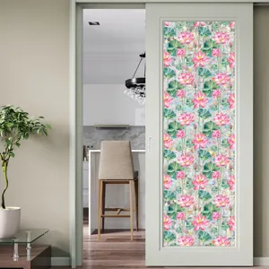 Static cling window film with pink lotus floral pattern for glass doors and home decor privacy.