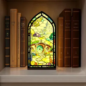 Insert book nook con vetrate colorate e design di castello fantastico per decorazione.