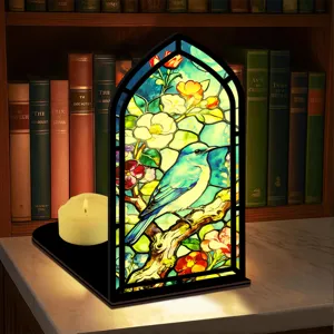 Inserto fermalibri in vetrata colorata con uccellino blu e fiori, decorazione vintage.