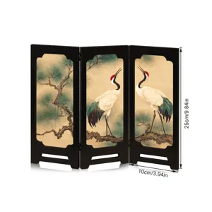 Detailed view of the miniature wooden folding screen showcasing exquisite crane and pine art.