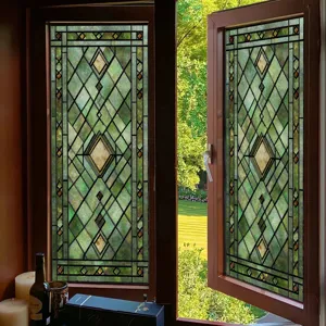Stained glass window film detail shot featuring elegant green geometric diamond pattern design.