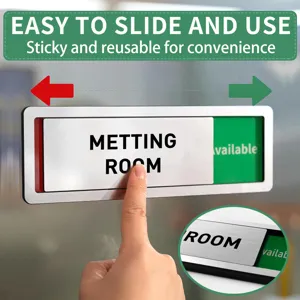 Sliding meeting room door sign detail showing easy operation and clear status display.