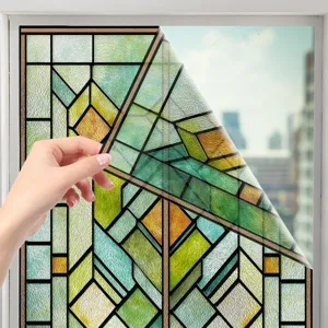 Close-up detail of 3D stained glass window sticker peeling off, geometric pattern, home decor.