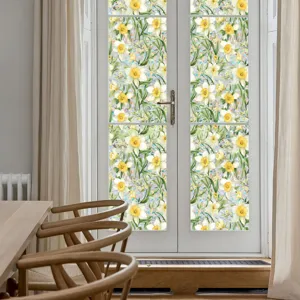 Decorative static window film with yellow daffodil flower pattern for glass door privacy.