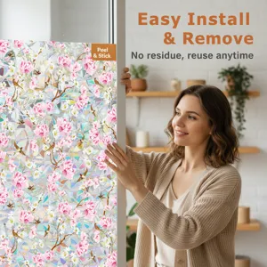 Decorative floral window privacy film with pink peony and bird pattern for home decor.
