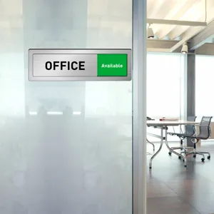 Office sliding door status sign detail showing metal finish and green available indicator view.