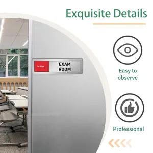 Sliding door status sign detail view, professional office meeting room indicator, metal brushed finish.