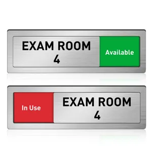 Sliding door sign detail, metal exam room status indicator showing available and in use states.