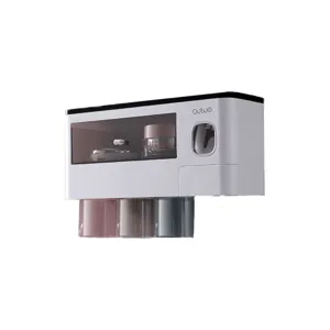 Wall-mounted bathroom toothbrush holder set featuring an automatic toothpaste dispenser and cups.