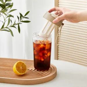 Portable plastic cold brew coffee maker cup with 150 mesh fine filter and strap for summer.