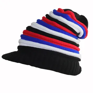 Detailed view of the colorful striped knit beanie with visor, showing fine knit texture.
