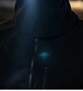 Detail shot of thermal fleece cycling face mask with zipper pocket and LED light feature.