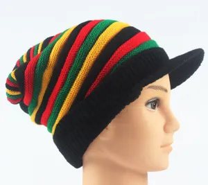 Reggae striped knit beanie with visor, colorful Rasta style winter warm pullover cap detail.