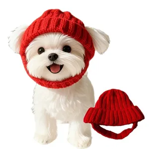 Red knitted pet hat for dogs, warm winter puppy hood with ear holes, cute dog apparel main image.