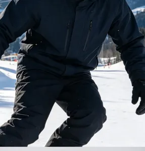 Men's outdoor windproof ski jacket and pants set, professional snow sport apparel for winter warmth.
